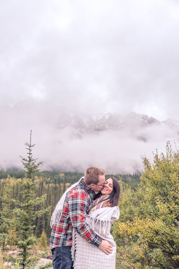 Lake Louise Engagement Photos infront of lake