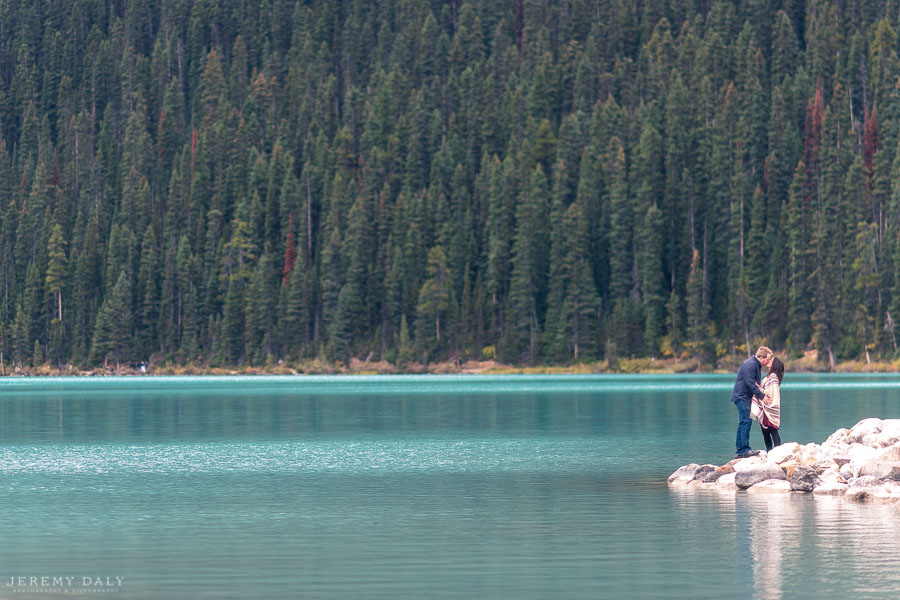 Lake Louise Engagement Photos infront of lake